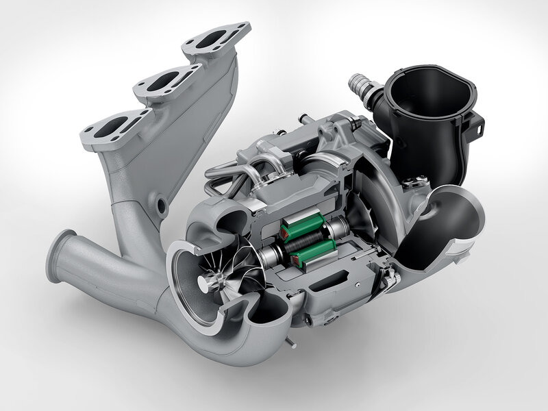 Technische Darstellung des T-Hybrid-Systems eines Porsche 911 Carrera GTS mit sichtbar dargestellten Komponenten auf neutralem Hintergrund.